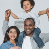 happy-african-american-parents-and-son-at-home-2021-08-31-21-58-21-utc